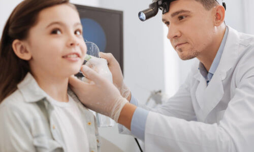 Child and Doctor; Child with Grommets